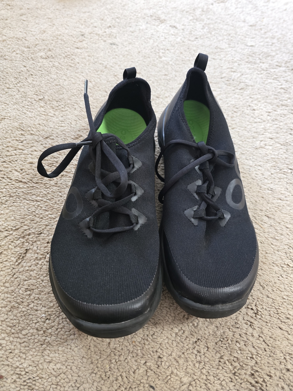 OOFOS Women's Black Athletic Slip-On Sneakers with Green Insoles
